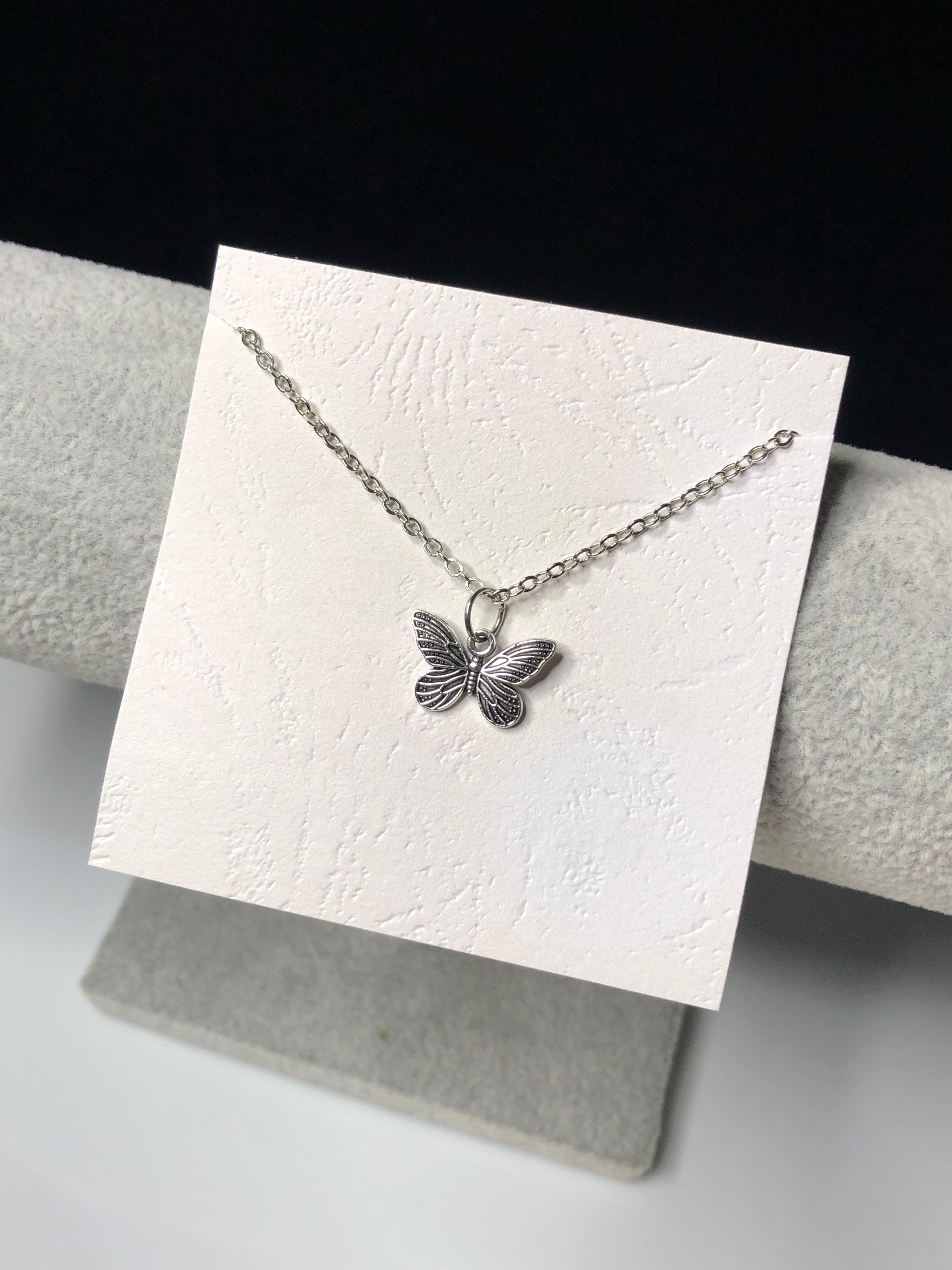 Silver butterfly charm necklace